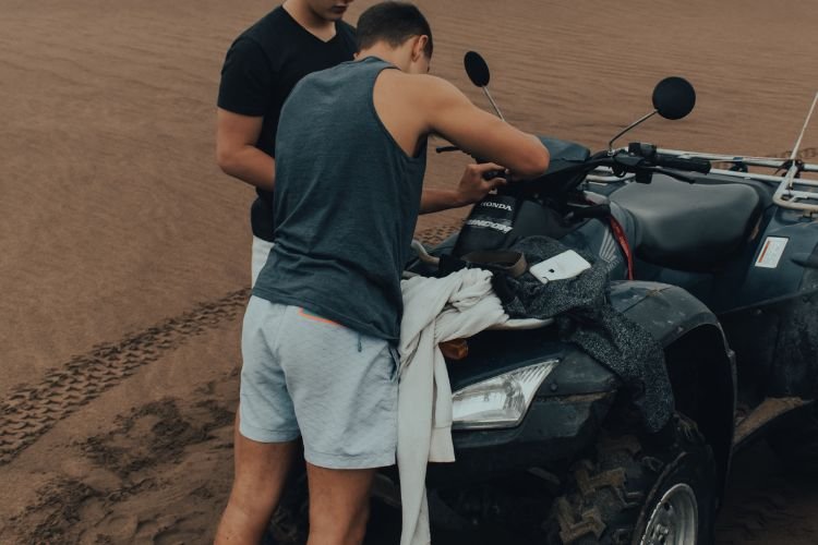 Using Liquid Wax To Restore Faded ATV Plastic