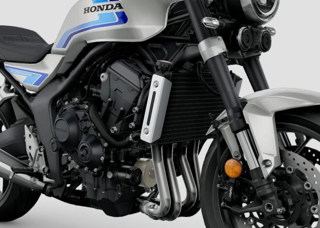 a sculpted flat fuel tank with retro pinstripes