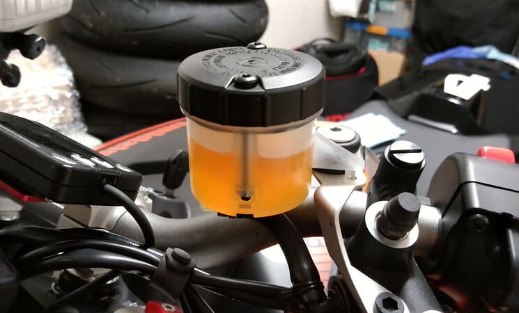 check the color of the brake fluid