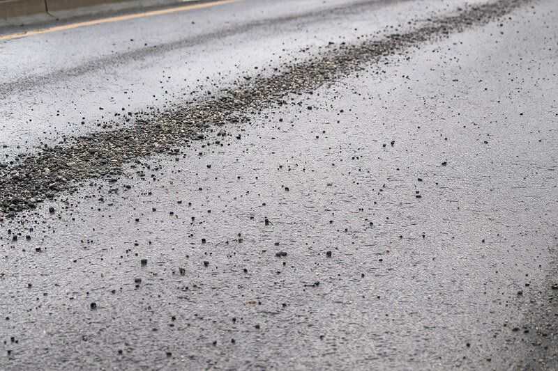 Loose gravel surface—causes of motorcycle death wobble