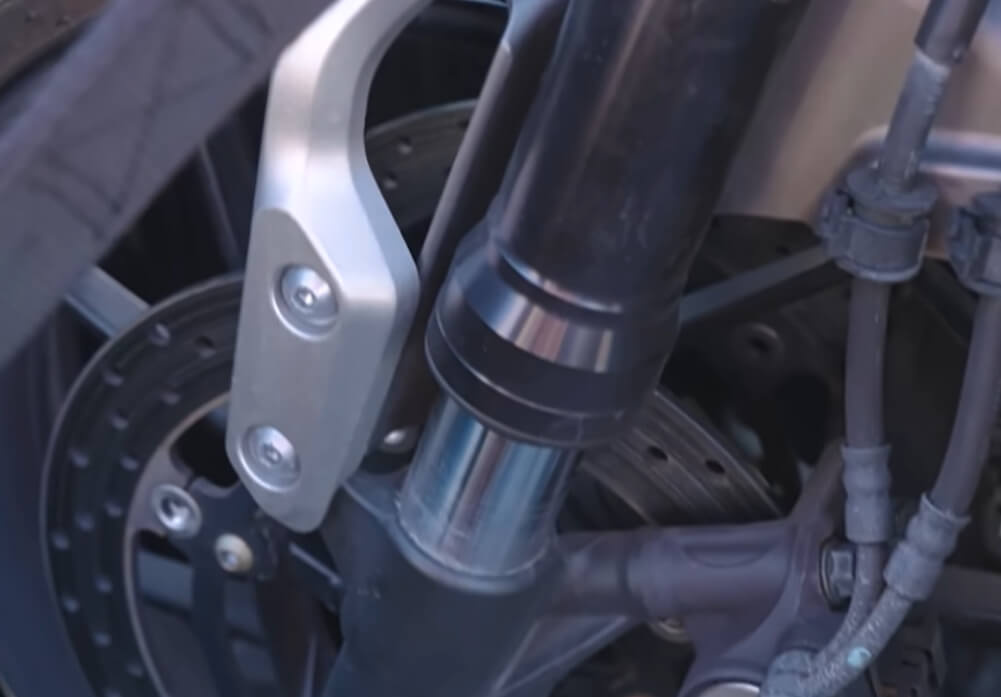 the motorcycle fork should compress about halfway