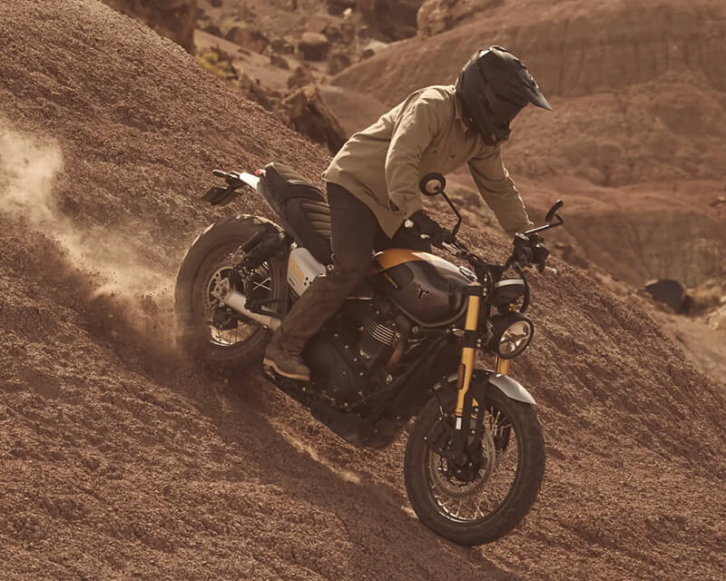 triumph scrambler 900 on a rough road
